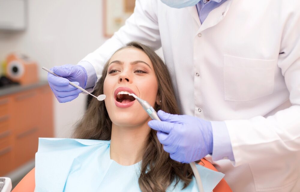 patient having dental checkup - How to Clean Braces in Tulsa, OK